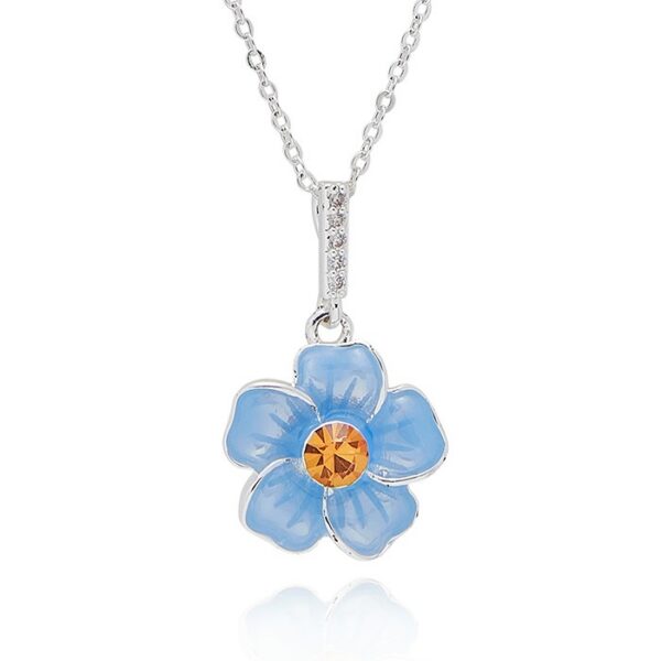 Beautiful Equilibrium Forget Me Not necklace featuring a delicate blue enamel flower with sparkling crystal centre. A meaningful gift symbolising love, remembrance and cherished memories.