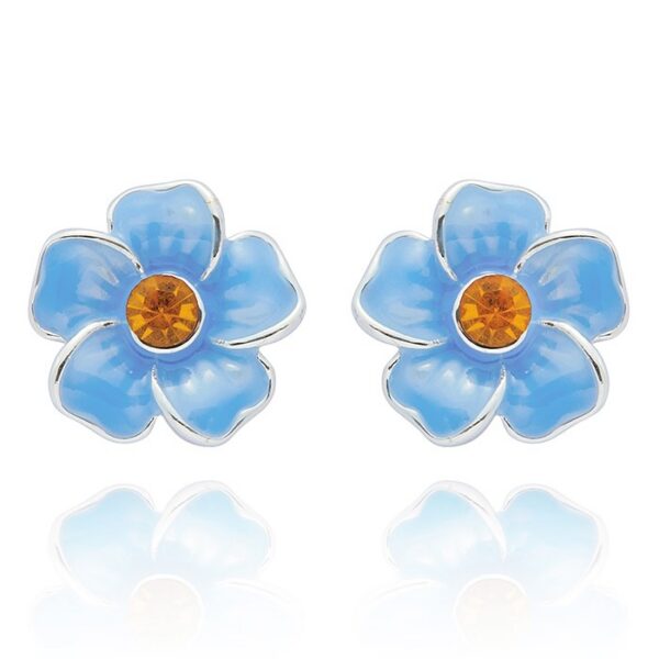 Silver plated Forget Me Not flower stud earrings with blue enamel petals and crystal centres by Equilibrium Jewellery.
