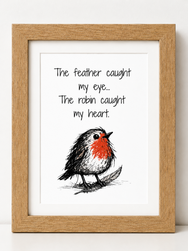 Robin framed print featuring a feather and robin illustration with the quote The feather caught my eye, the robin caught my heart from the Scribbled with Love Little Hellos Collection.