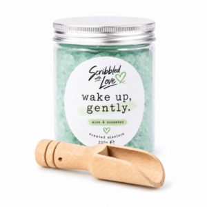 Wake Up Gently Aloe & Cucumber Scented Sizzlers by Scribbled with Love in a reusable jar with wooden scoop