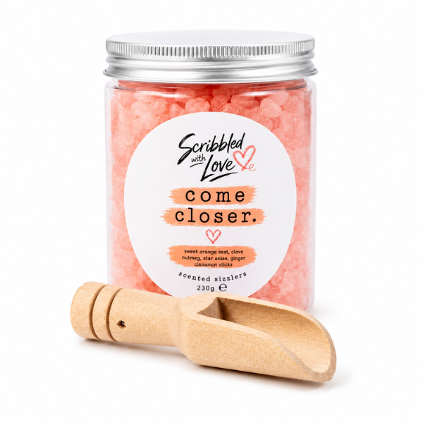 Come Closer Sweet Orange Zest, Clove and Cinnamon Scented Sizzlers by Scribbled with Love in a jar with wooden scoop